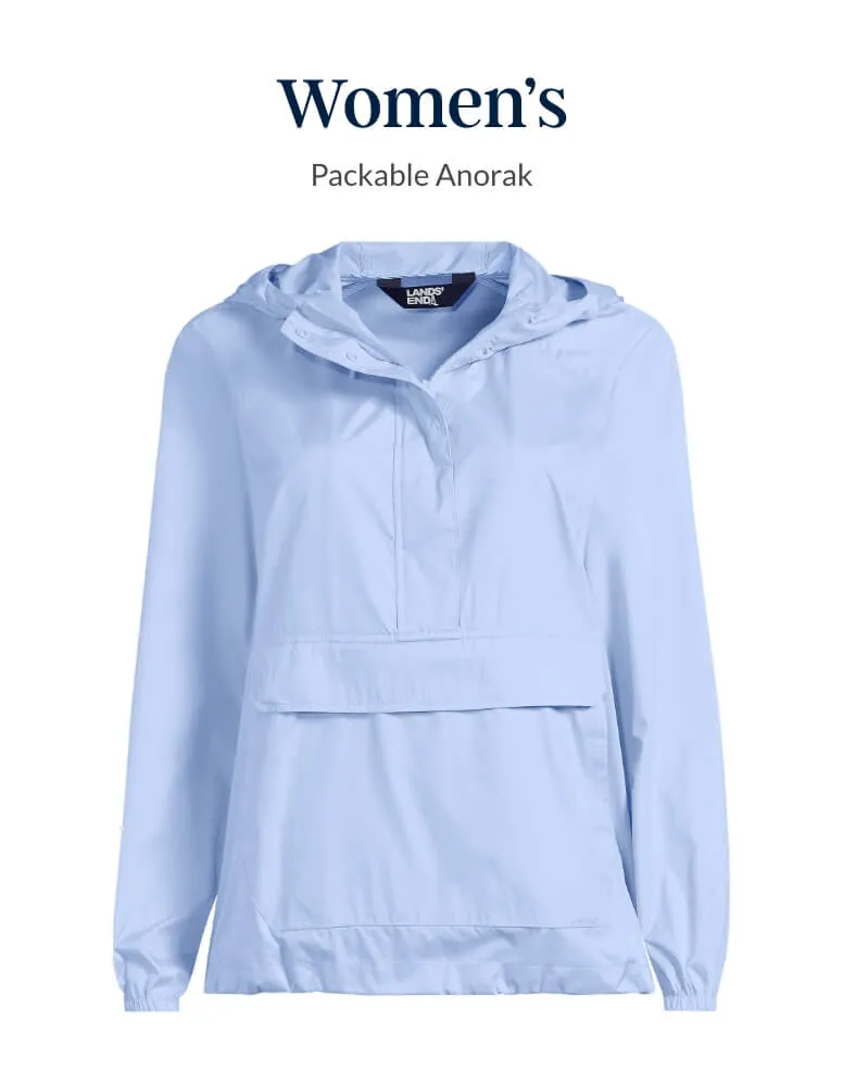Women's blue packable anorak rain jacket.