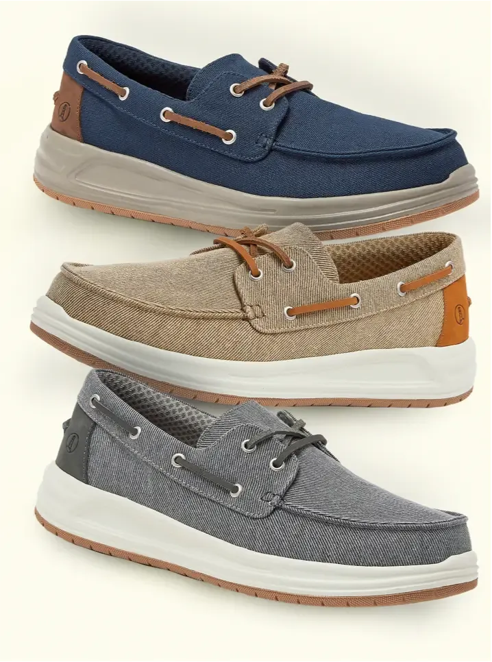 Multiple pairs of canvas boat shoes displayed in different colors: navy, tan and gray, each with lace details and rubber soles.