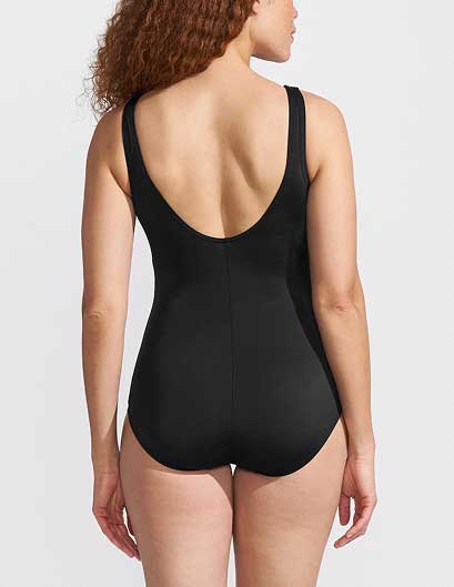 Woman wearing a full coverage swimsuit