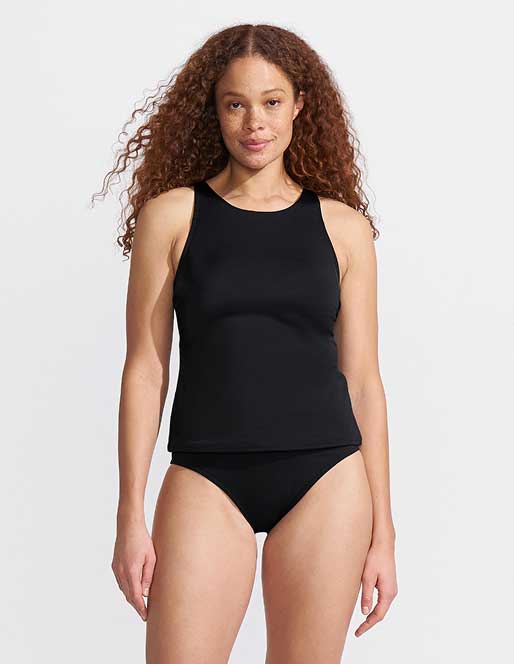 Woman wearing a high neck swimsuit